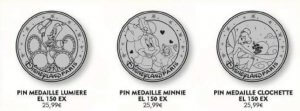 drei Disneypins in Medaillenform mit unterschiedlichem Motiv