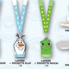 Drei Pin-Lanyards und zwei Pins mit Disney-Motiven: Dschinnie, Olaf, Pascal, 